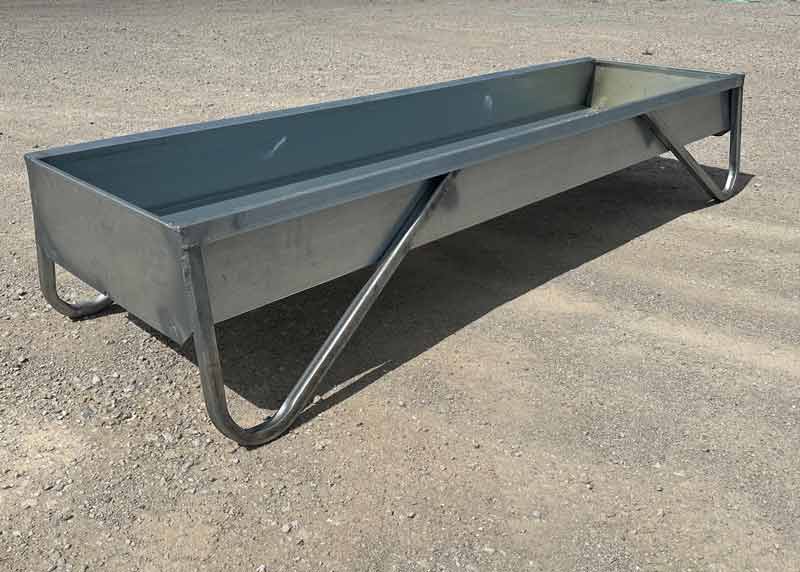 Front angle view of MF08 galvanized feed bunk with galvanized steel construction