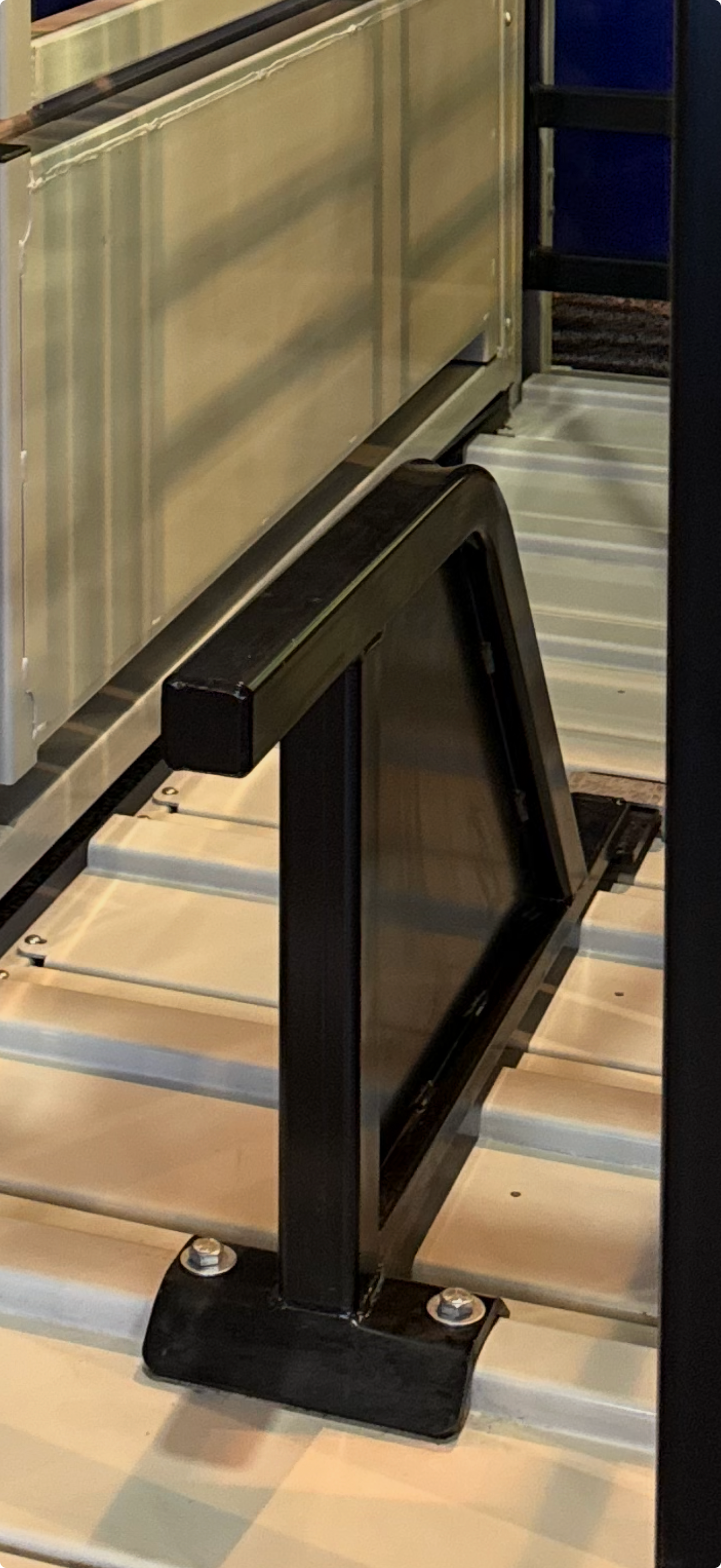 Top Hand Squeeze Chute brisket bar for keeping cattle standing while in the chute.