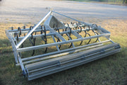 Rear crumbler bar and leveling system on Buster 2.0 arena groomer for horse arena footing maintenance