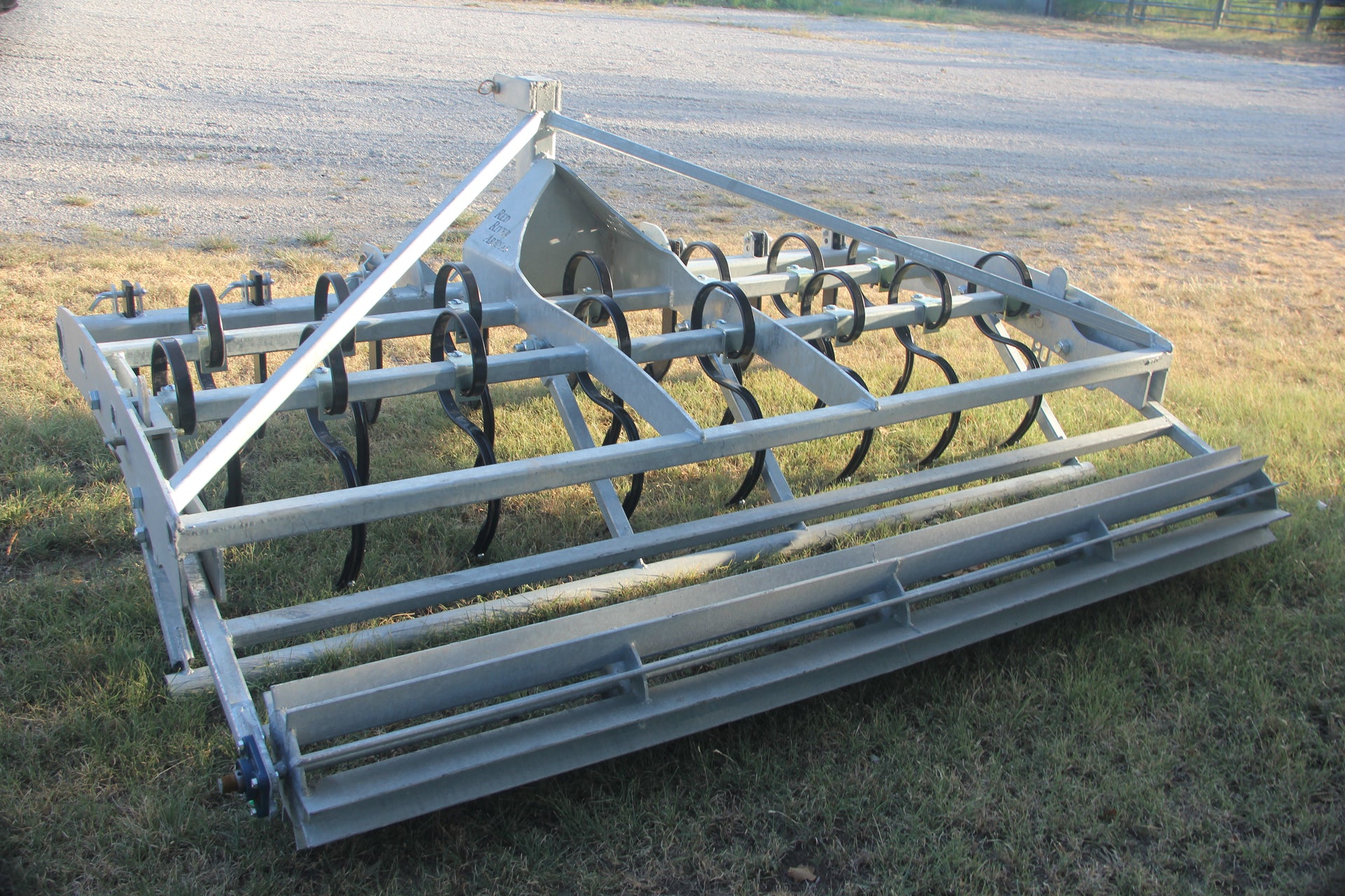 Rear crumbler bar and leveling system on Buster 2.0 arena groomer for horse arena footing maintenance