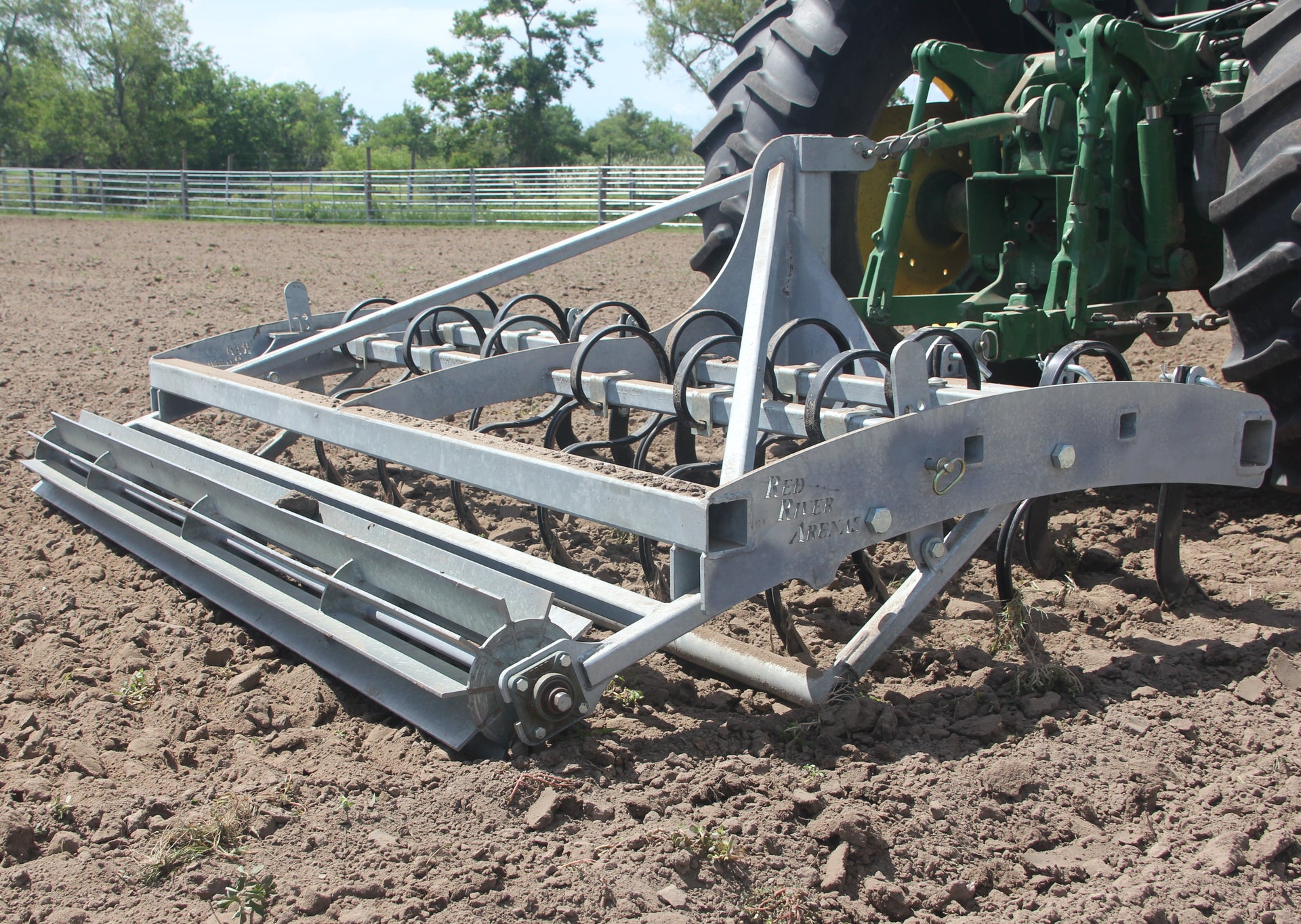 Heavy-duty Buster 2.0 arena groomer and arena drag leveling horse arena footing behind tractor