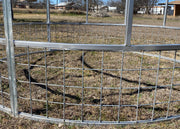 Close up of 4x4 wire mesh skirt on R3 economy round bale feeder