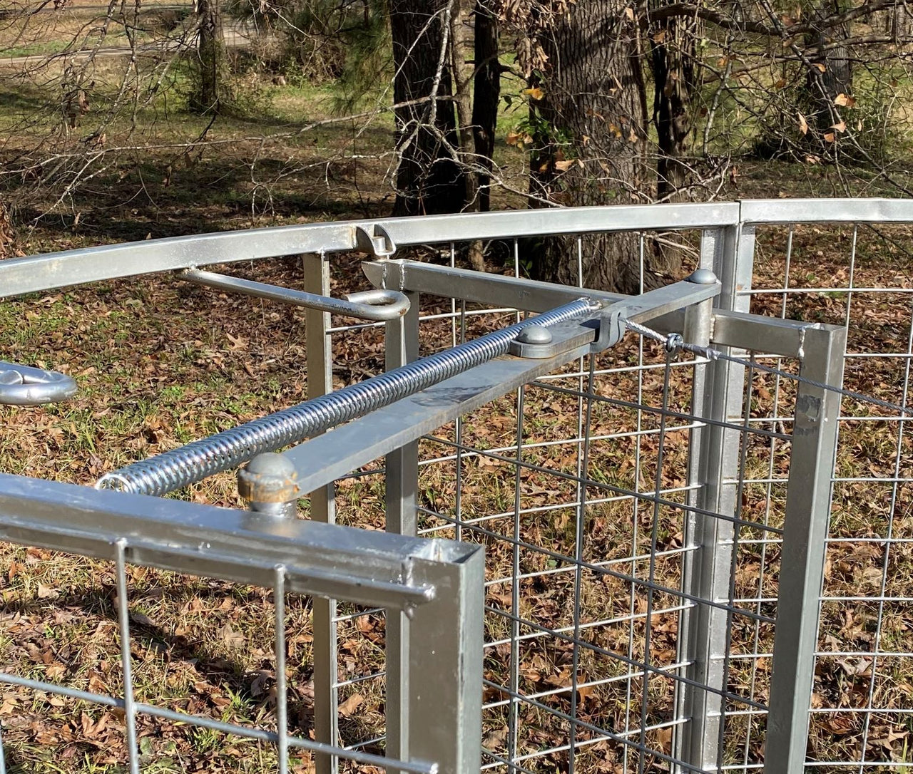 Texas Swine Saloon hog trap trigger mechanism and spring-loaded door system. Good for DIY hog traps